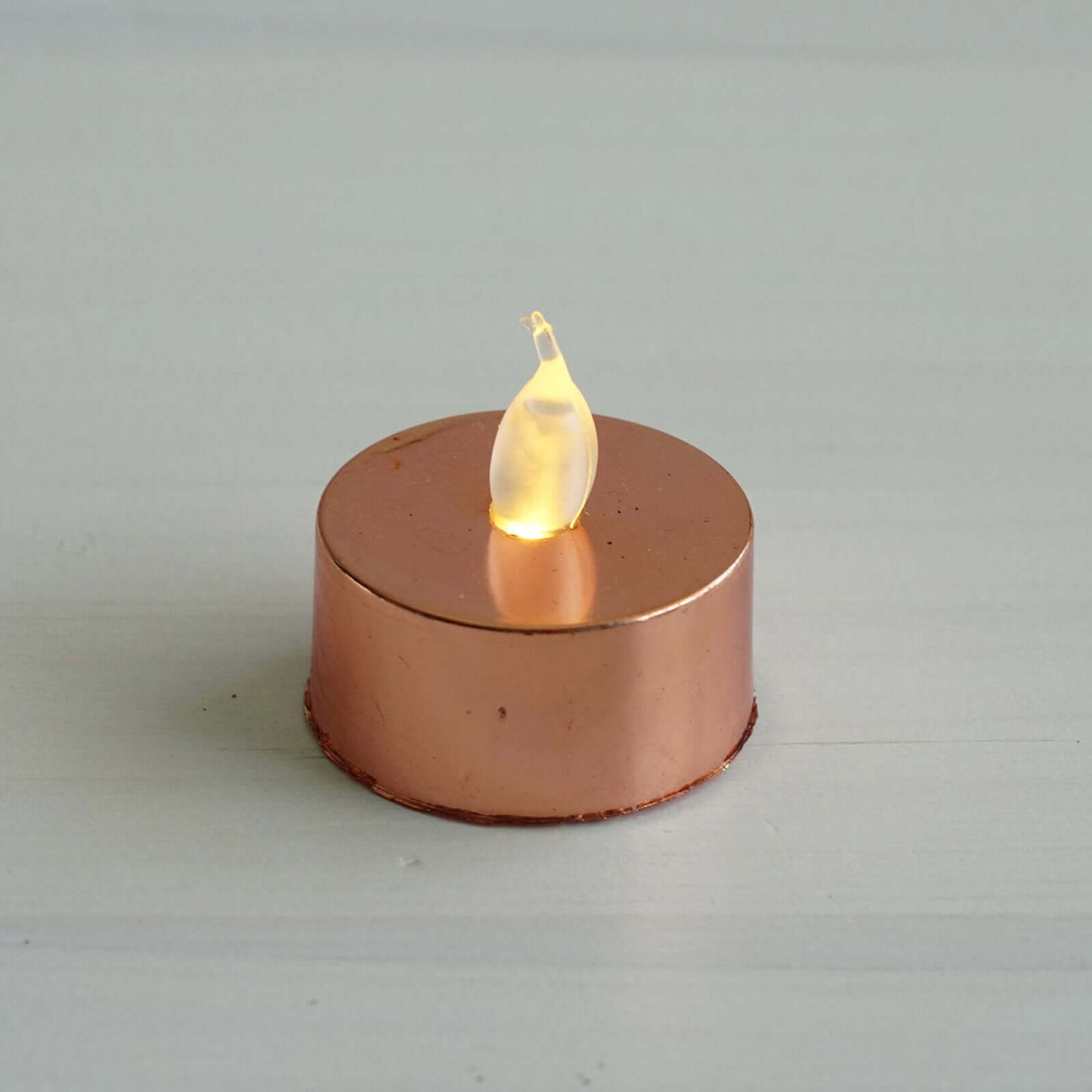 12 - Pack LED Tealight Candles Rose Gold Metallic Design - Reusable Flameless Battery Operated Lights - Linen Luxes