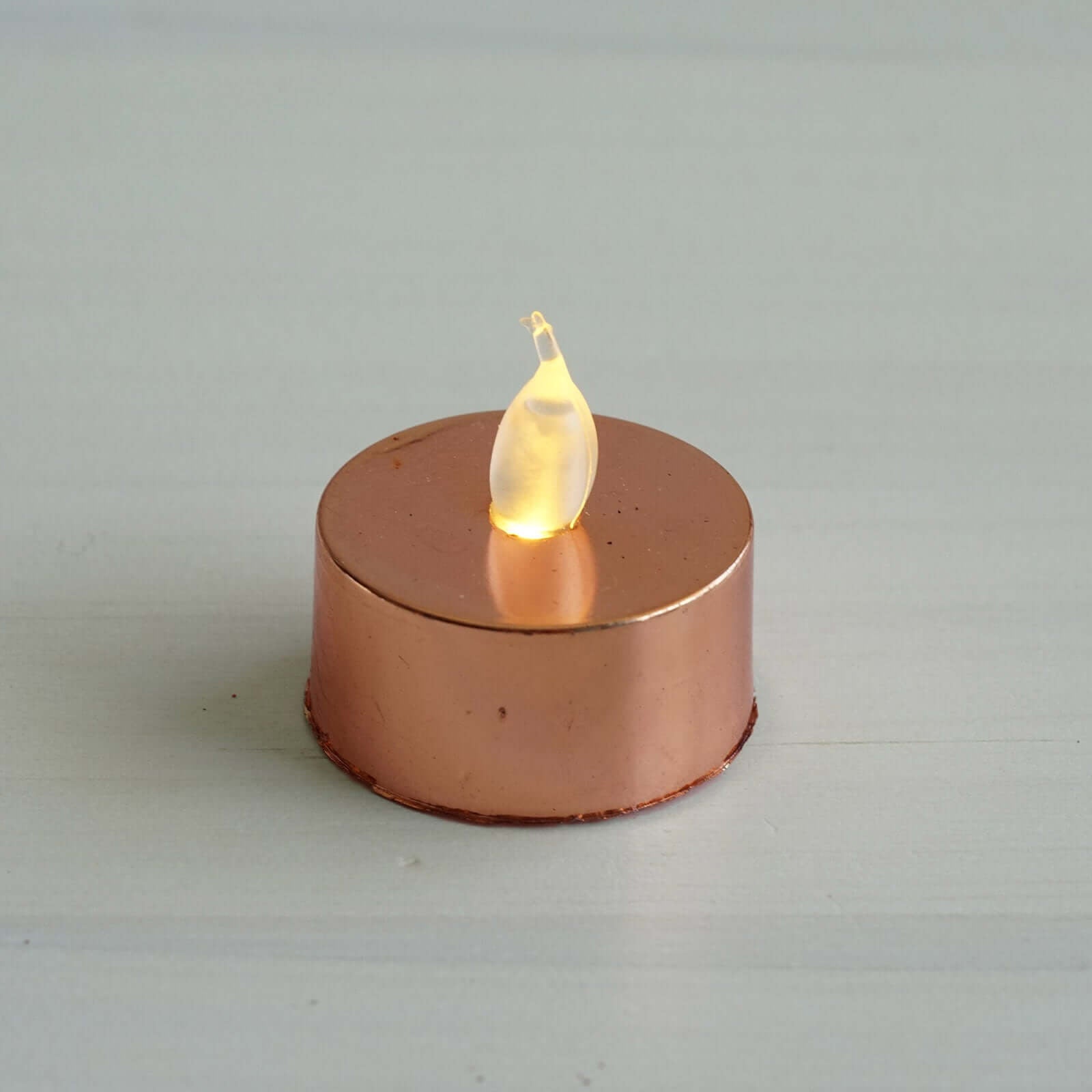 12 - Pack LED Tealight Candles Rose Gold Metallic Design - Reusable Flameless Battery Operated Lights - Linen Luxes