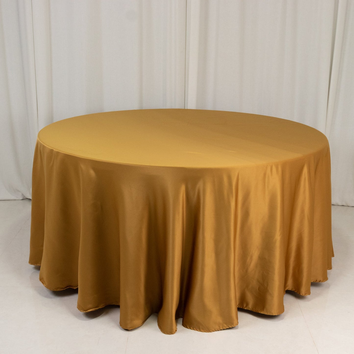 Lamour Satin 120" Round Tablecloth Gold - Seamless Table Cover with Soft Tempered Sheen for Upscale Gatherings