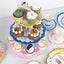 2-Pack Cardboard Round Cupcake Stand Assorted Floral Design - 3-Tier Reusable Dessert Display Pedestal With Scalloped Edges for Garden-Themed Celebrations 14"