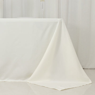Fire Retardant Premium Polyester 90"x132" Rectangular Tablecloth Ivory - High-Performance Seamless Table Cover