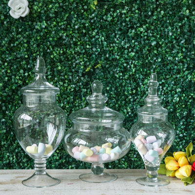Set of 3 Glass Candy Jars Pedestal Apothecary Design Clear with Snap - On Lids - Stylish Party Favor Containers 10"/12"/14" - Linen Luxes