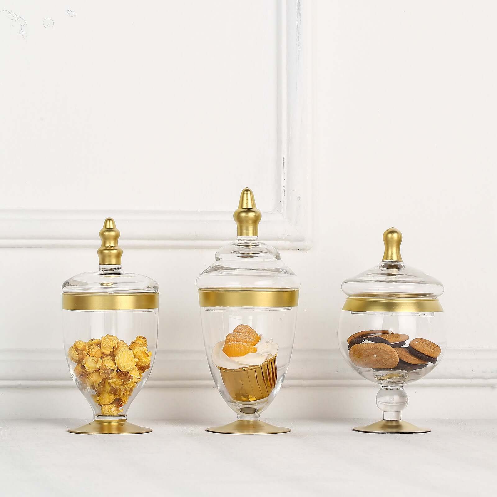 Set of 3 Glass Jars Apothecary Design Clear with Gold Trim and Snap - On Lids - Stylish Decorative Candy Buffet Storage 8.5", 9", 10" - Linen Luxes