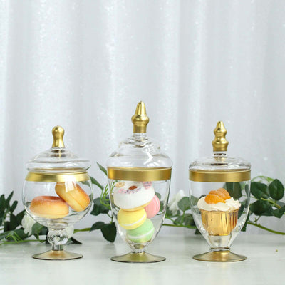 Set of 3 Glass Jars Apothecary Design Clear with Gold Trim and Snap - On Lids - Stylish Decorative Candy Buffet Storage 8.5", 9", 10" - Linen Luxes