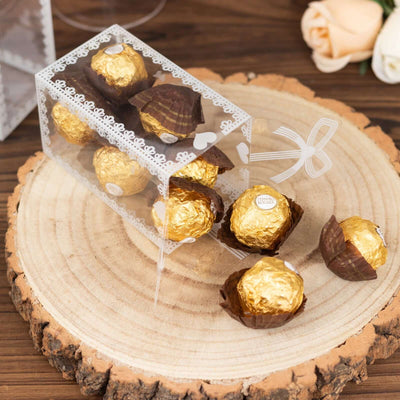 25 Pack Clear Rectangle Candy Gift Boxes With Bowknot and White Lace Pattern, 4" Transparent Plastic Party Favor Boxes - 2"x2"x4"